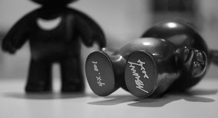 Two Madbunny figures, one signed on the feet